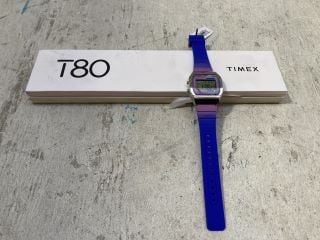 TIMEX T80 WATCH WITH DIGITAL DIAL AND PURPLE RESIN STRAP: LOCATION - D14