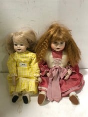 A PAIR OF COLLECTORS DOLLS