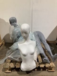 A PALLET OF MANNEQUINS