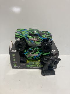 BOX OF ITEMS TO INCLUDE SAND MONSTER OFF ROAD TRUCK