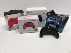 QUANTITY OF XBOX CONTROLLERS TO INCLUDE BLACK XBOX ONE CONTROLLER: LOCATION - P RACK