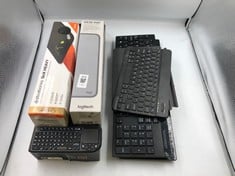 QUANTITY OF ITEMS TO INCLUDE LOGITECH DESK MAT: LOCATION - T RACK