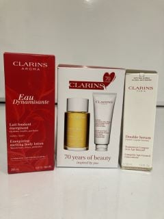 A COLLECTION OF CLARINS ITEMS TO INCLUDE DOUBLE SERUM COMPLETE AGE CONTROL CONCENTRATE 50 ML (3380810149678) ENERGISING MELTING BODY LOTION 200ML (3666057025860 TOTAL RRP £173