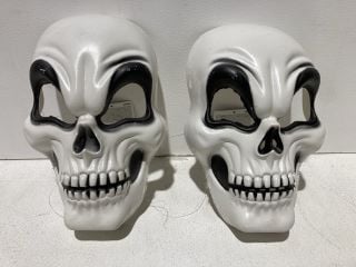 A BOX TO INCLUDE SKULL MASKS