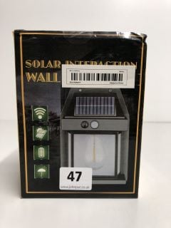 SOLAR SENSOR INTERACTIVE OUTDOOR WALL LIGHT (VAT ONLY PAYABLE ON BUYERS PREMIUM)