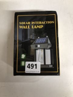 SOLAR SENSOR INTERACTION OUTDOOR WALL LAMP (VAT ONLY PAYABLE ON BUYERS PREMIUM)