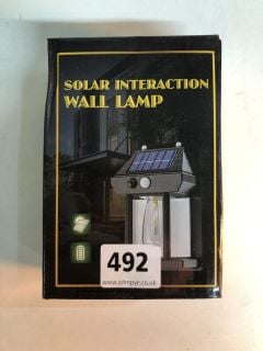 SOLAR SENSOR INTERACTION OUTDOOR WALL LAMP (VAT ONLY PAYABLE ON BUYERS PREMIUM)