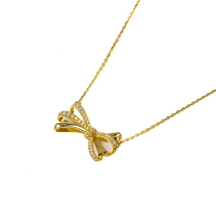 18K Yellow 0.20ct Diamond Bow Pendant  2.7x2cm with Fine Adjustable Chain, 46cm, total weight 4.4g.  Auction Guide: £550-£750