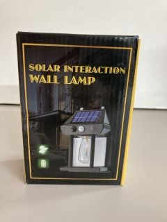 SOLAR SENSOR INTERACTION OUTDOOR WALL LIGHT (VAT ONLY PAYABLE ON BUYERS PREMIUM)