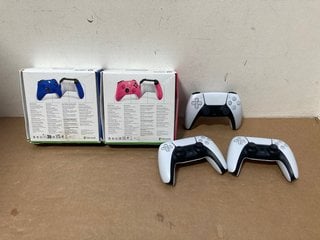 QTY OF GAMING CONTROLLERS IN DEEP PINK, SHOCK BLUE AND WHITE: LOCATION - BR5