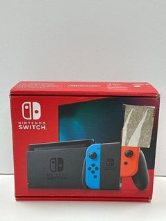 NINTENDO SWITCH 32 GB GAMES CONSOLE IN NEON RED/ NEON BLUE: MODEL NO HAC-001(-01, WITH BOX & ALL ACCESSORIES TO INCLUDE NEW SUPER MARIO BROS.U DELUXE) [JPTM127494] THIS PRODUCT IS FULLY FUNCTIONAL AN