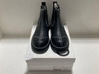 PAIR OF GANNI BOOTS IN BLACK WITH WHITE STITCHING : SIZE 7 UK - RRP £190: LOCATION - BR11