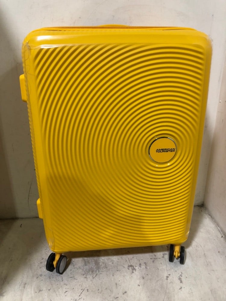 AMERICAN TOURISTER GOLDEN YELLOW 4 WHEEL SUITCASE