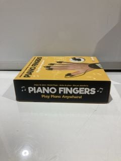 BOX OF PIANO FINGERS PLAY PIANO ANYWHERE