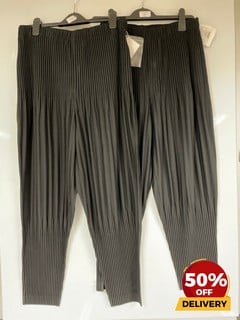 HOMME PLISSE ISSEY MIYAKE PLEATED BLACK TROUSERS 2/3 TOTAL RRP £390