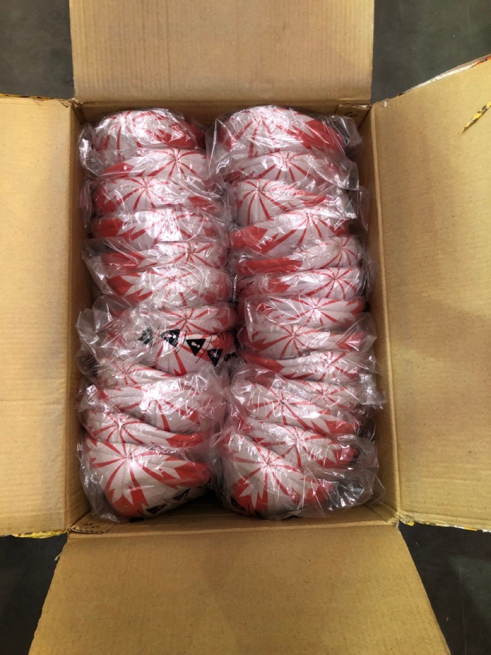 25 X ARAMIS RUGBY BALLS RED/WHITE: LOCATION - B