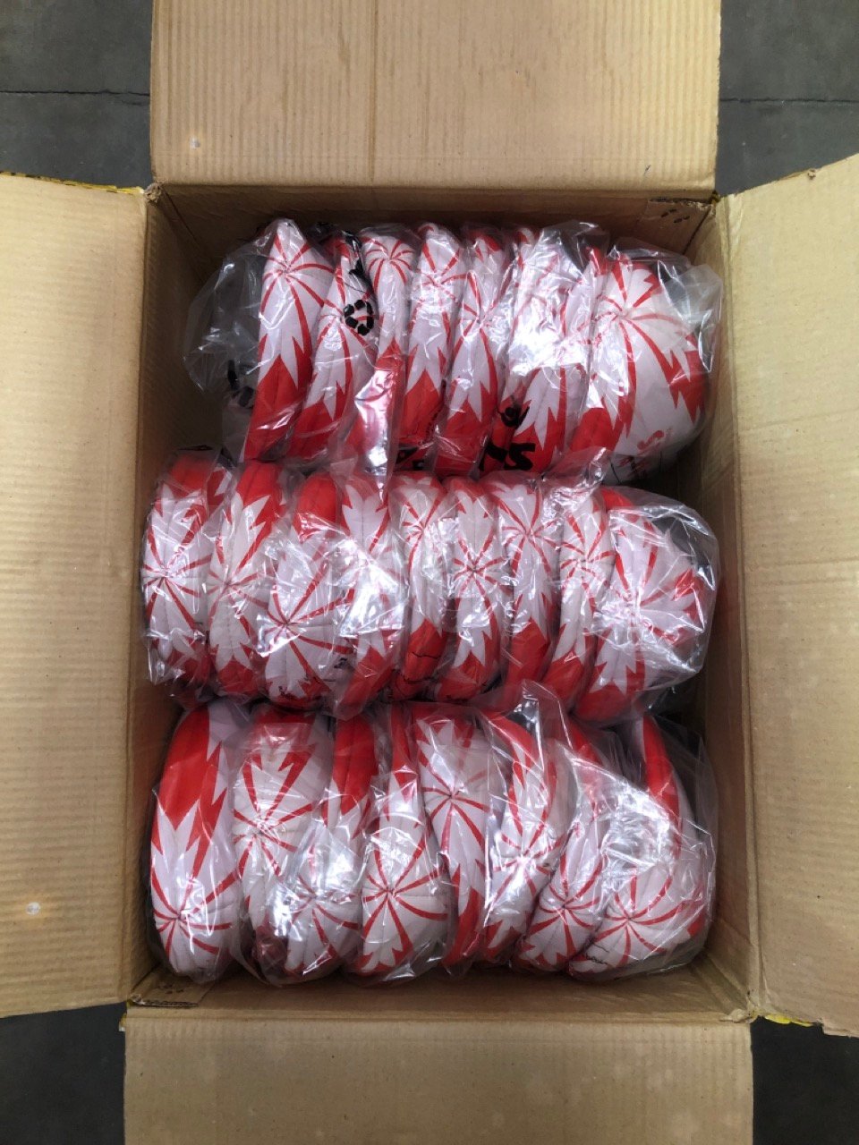 25 X ARAMIS RUGBY BALLS RED/WHITE: LOCATION - B