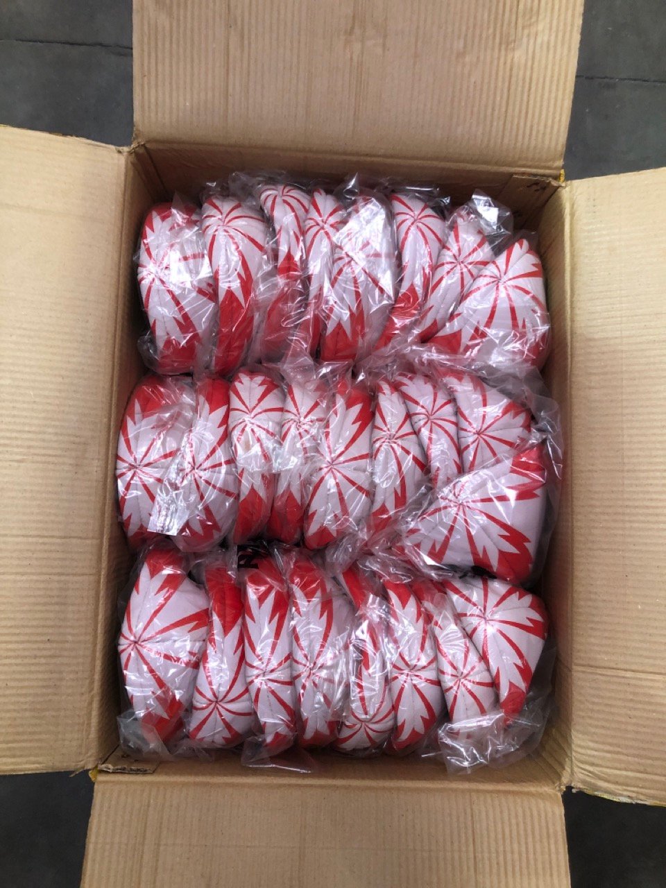 25 X ARAMIS RUGBY BALLS RED/WHITE: LOCATION - B