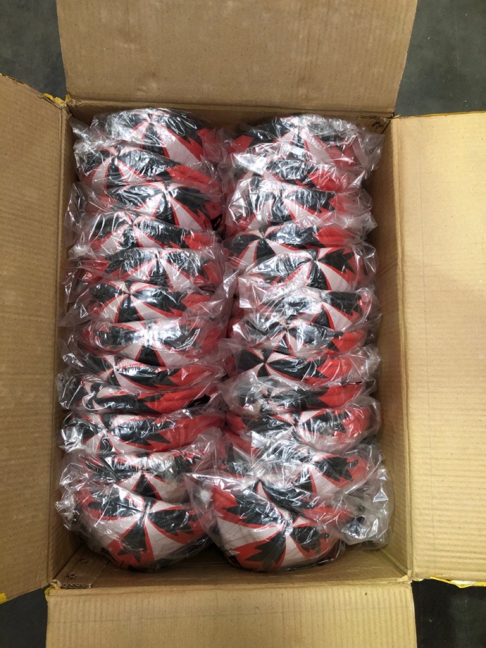 25 X ARAMIS RUGBY BALLS RED/WHITE: LOCATION - B