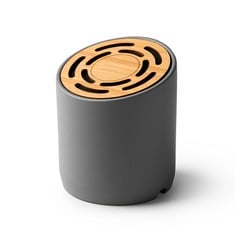 WIRELESS SPEAKER WITH BLUETOOTH 5.0, DESIGNED WITH ROUND CEMENT BODY AND BAMBOO SURFACE. IT HAS A POWER OF 3W AND A RECHARGEABLE BATTERY. INCLUDES CHARGING CABLE.