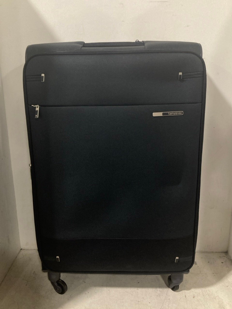 SAMSONITE NAVY 4 WHEEL SUITCASE