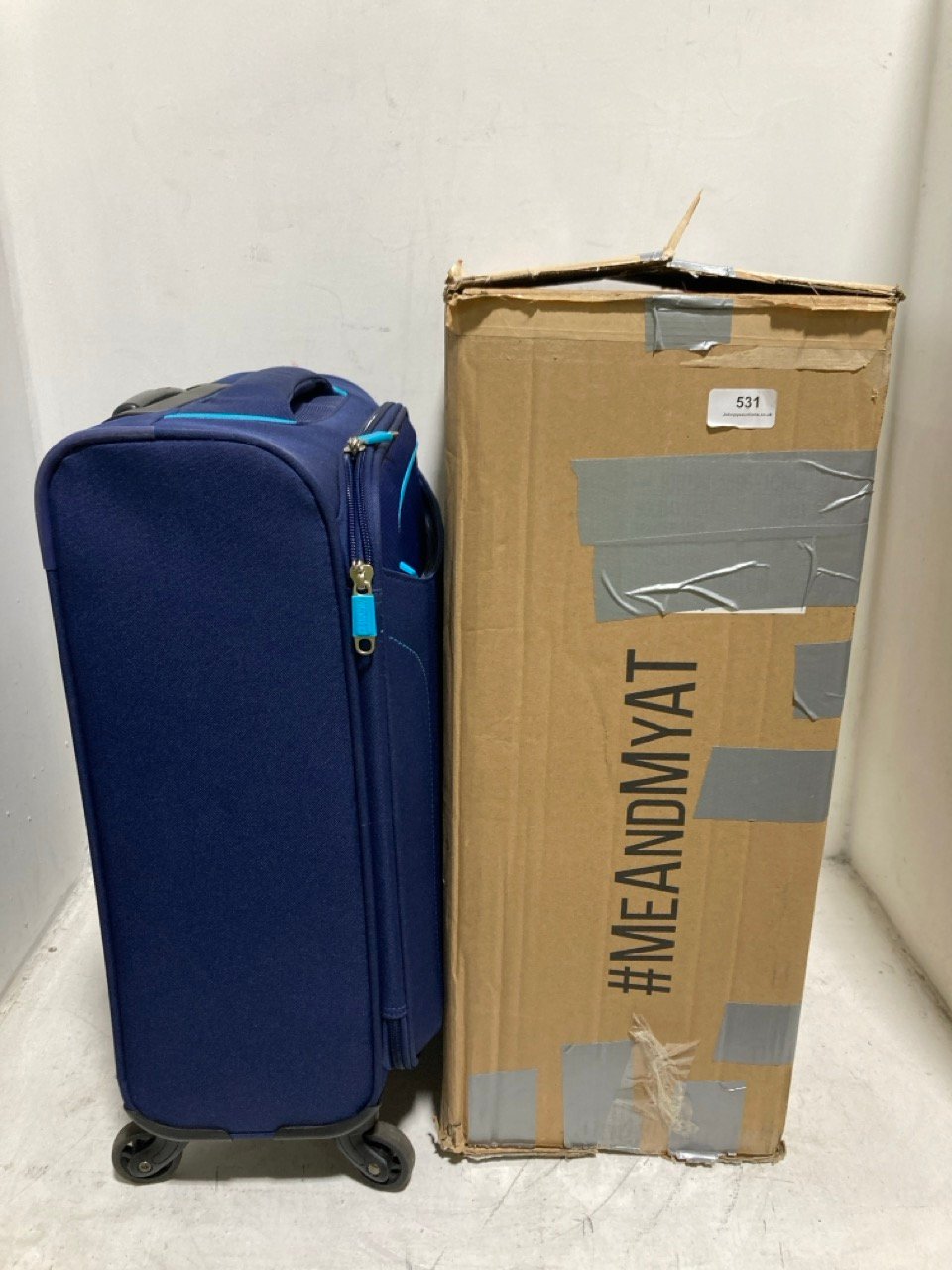 AMERICAN TOURISTER BLUE 4 WHEEL SUITCASE