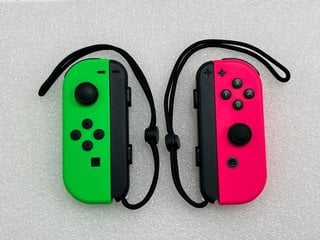 NINTENDO SWITCH JOY-CON PAIR GAMES CONSOLE ACCESSORIES IN NEON GREEN / NEON PINK: MODEL NO HAC-015, HAC-016 (UNIT ONLY) [JPTM127953]