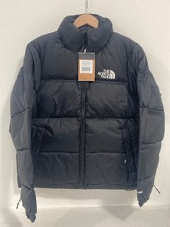 THE NORTH FACE 1996 RETRO NUPTSE JACKET IN BLACK - UK SIZE XS - RRP £315.00: LOCATION - FRONT BOOTH