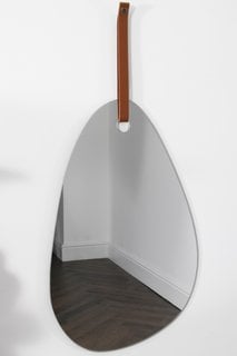 PEBBLE SHAPED MIRROR WITH BROWN LEATHER HANGING STRAP: LOCATION - BR1