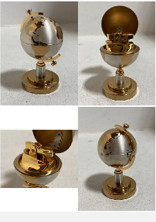 A VINTAGE TABLE LIGHTER IN THE FORM OF A GLOBE: LOCATION - BR8