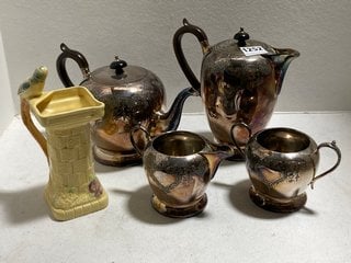 A FOUR PIECE PLATED ANTIQUE TEA AND COFFEE SET AND AN ART DECO VASE: LOCATION - BR9