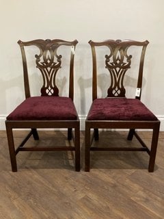 PAIR OF ANTIQUE STYLE DINING CHAIRS IN DARK WOOD FRAME FINISH WITH PLUM PLUSH FABRIC SEAT PADS: LOCATION - C1