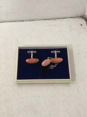 A PAIR OF JAPANESE CORAL CUFFLINKS AND COLLAR STUD