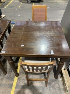 DARK VARNISHED DINING TABLE TO INCLUDE TWO ASSORTED DESIGN DINING CHAIRS.