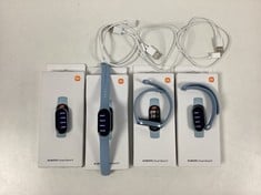 XIAOMI SMART BAND 9 4 X SMARTWATCHES LOT (ORIGINAL RRP - €155,48) IN BLUE. (4 X WITH CASE. 3 X STRAP AND CHARGER.) [JPTZ8153]